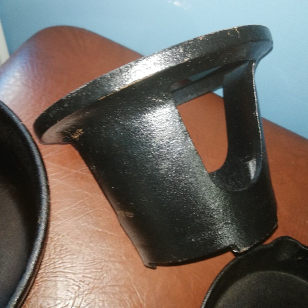 cast iron stew pot and others (Category: Cookware & Accessories) located in Paranaque City. Submitted by 4thestate.surplusan (Listing ID 1310691489, Image 2). Description: all cast iron . stew pot, brand, monocoop. 18cm dia x 10 cm depth. skillet, unnamed, 15cm diax 3cm depth.burner stand, brand ishigaki, 16cm dia x 10cm height. all are in good condition. retail or take all. pm only.mop gcash. fourth est paranaque.