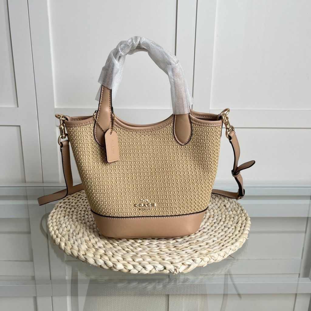 Coach straw bucket bag deals