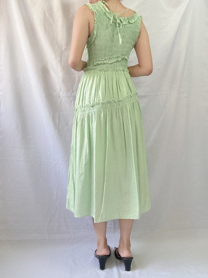 Light green smocked dress (Category: Dresses) located in Manila. Submitted by reduxarchives (Listing ID 1310642079, Image 2). Description: Light green smocked dress S-M | W24-34” L45”.