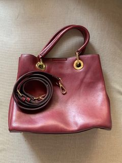 Maroon bag with detachable strap
