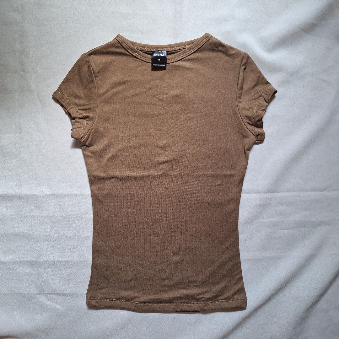 MERA Basics Naomi T-shirt - Khaki (Category: Shirts) located in Caloocan City. Submitted by gnvvp (Listing ID 1310693059, Image 1). Description: - brand new!!! - best fits xs to small frames - rfs dont like the color 🥹.