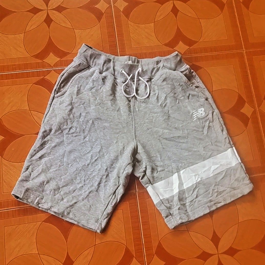 NEW BALANCE SHORT (Category: Shorts) located in Manila. Submitted by thriftteeth (Listing ID 1309790288, Image 1). Description: NO ISSUE 10/10 COLOR RATE FREEWAIST X 19.5 LENGTH COURIER JNT MOP GCASH.