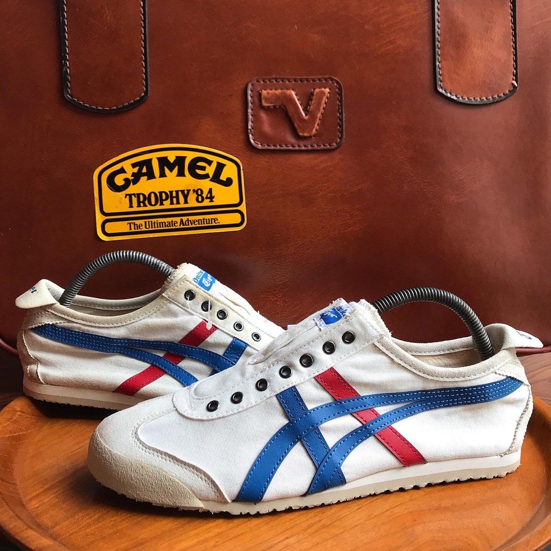 Onitsuka tiger vs asics logo store