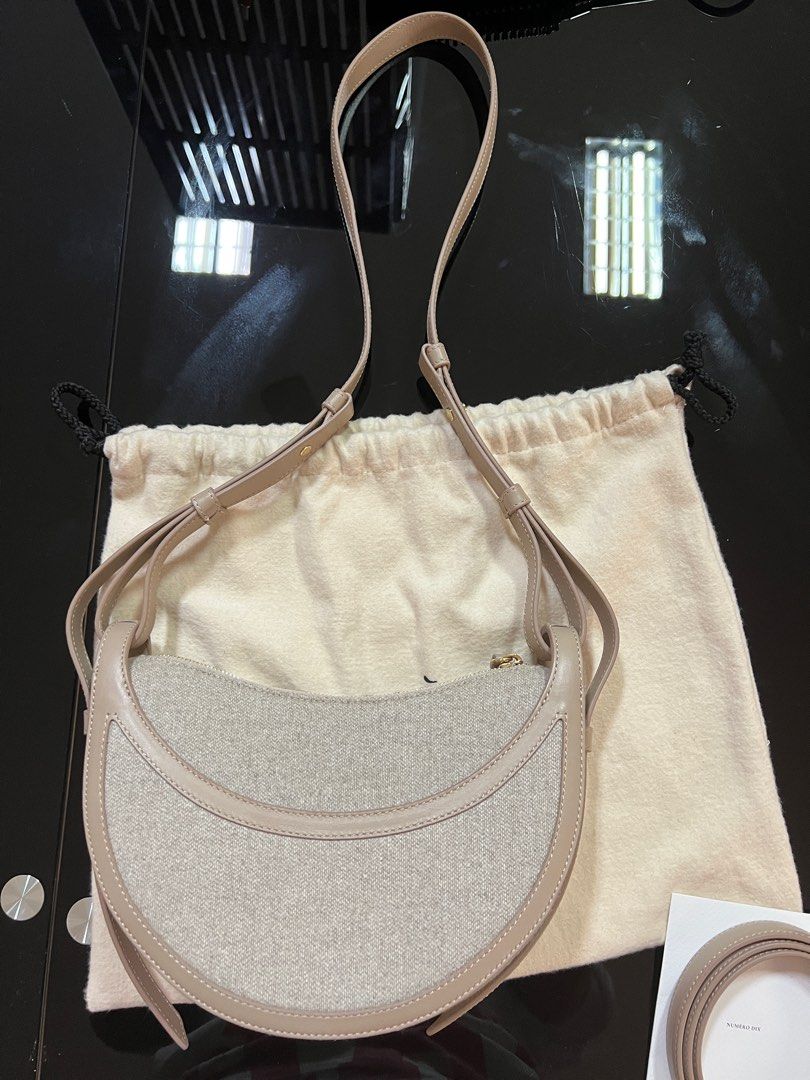 Polene numero Dix bag (TAUPE CANVAS) (Category: Luxury Bags & Wallets) located in Binan City. Submitted by lushlifeph (Listing ID 1310794464, Image 3). Description: Rfs my sister can’t fit much inside the bag Bought around May 2023 (before their quality went down) Used once and no flaws Materials and sizing - Certified Italian full grain smooth calf leather. - Dimensions: 24 x 20 x 7.5 cm. Weight: 386 g. Comes with two adjustable straps. A long s