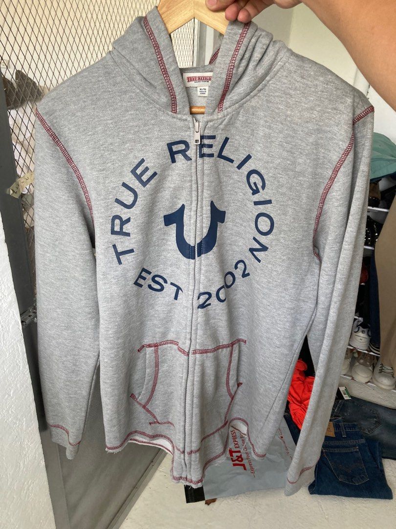 Authentic True Religion Zip Up Light Gray Softy Warmer Hoodie for Men’s,XL on tag dimes is 20.4 X 27 (Category: Hoodies) located in Santo Domingo. Submitted by welldetailedseller (Listing ID 1303672692, Image 1). Description: •Authentic True Religion Zip Up Light Gray Softy Warmer Hoodie for Men’s •mahal napo nabili to As New po ito sobrang ganda ng Tela panalo to pwedeng pwede pang Rides • Like New Condition •No Issue •Color Rate 10/10 •Actual d