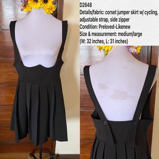 Black pleated jumper skirt w/ inner cycling