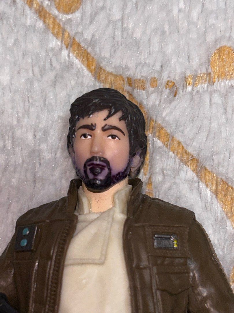 Cassian Andor & Jyn Erso Figures from Black Series 3-Pack (Category: Figurines & Statues) located in Marikina City. Submitted by nigeljames (Listing ID 1310975672, Image 2). Description: Take both for ₱299. Complete accessories. Issues: - Cassian Andor figure has purple marker discoloration around beard area. - Joints are a bit loose on the Jyn Erso figure. Message me for offers or inquiries..