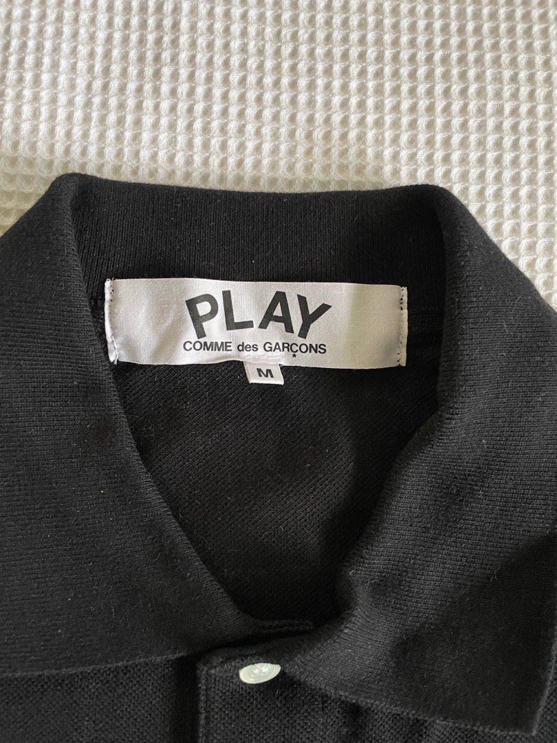 Comme De Garçons (CDG PLAY) Black Collared Shirt Size Medium (Category: Tshirts & Polo Shirts ) located in Quezon City. Submitted by hydroflask123 (Listing ID 1310947057, Image 3). Description: CDG Play Black Collared Shirt. Japanese fit so runs small. No issues!! W (Pit to Pit): 49cm L (Top to Bottom): 62cm Sleeves (Shoulder to End): 20cm Good discounts if you buy more than 1 item!!.