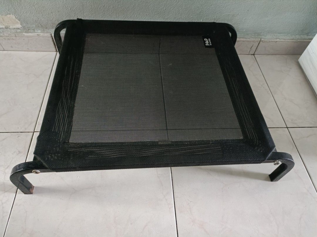 Dog Elevated Waterproof Bed (Category: Homes & Other Pet Accessories) located in Singapore. Submitted by craybeautylove (Listing ID 1310861349, Image 1). Description: L69cm X W55cm X H15cm Quality is very good with thick metal and sturdy mesh. Rarely use as my dog prefer to sleep on his blanket. So clearing up space and letting go more than 60% off the retail price ($75) I bought. You see what you get Self pick up at Boon Lay Mrt.