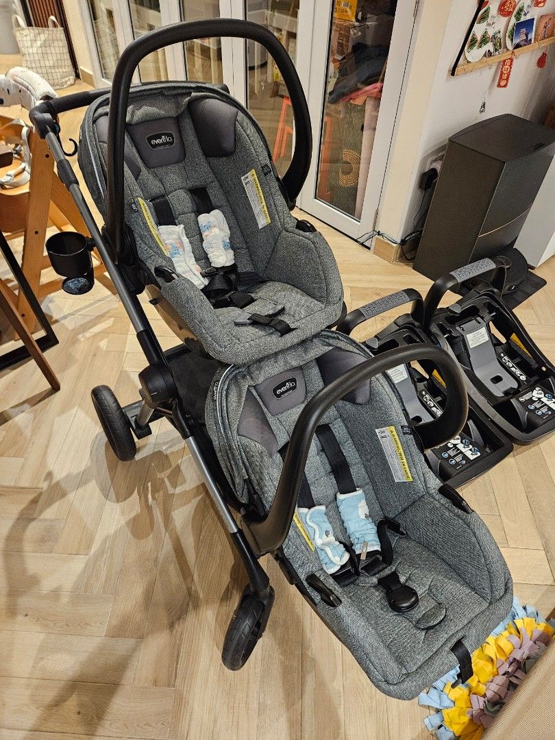 Evenflo Pivot XPAND stroller frame and car seats