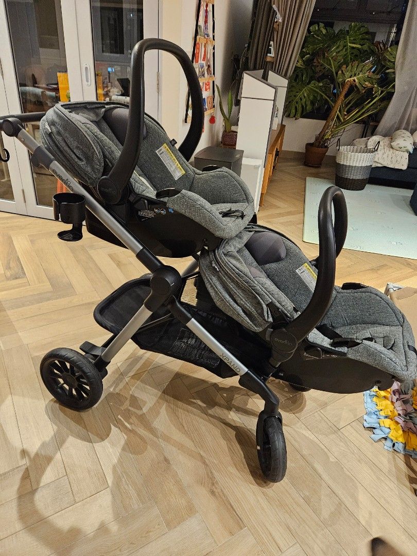 Evenflo Pivot XPAND stroller frame and car seats