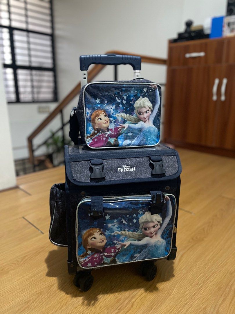 frozen trolley bag (Category: Strollers) located in Cainta. Submitted by sanri0girl (Listing ID 1310917510, Image 1). Description: selling my little sister’s frozen trolley bag (can pass as brand new) 🤍 — ₱3.5k only — WITH LUNCH BOX! — 4 wheels — clean, no issues — less than 1 school year lang nagamit 📍for pick up at Carmona St., VVEV.