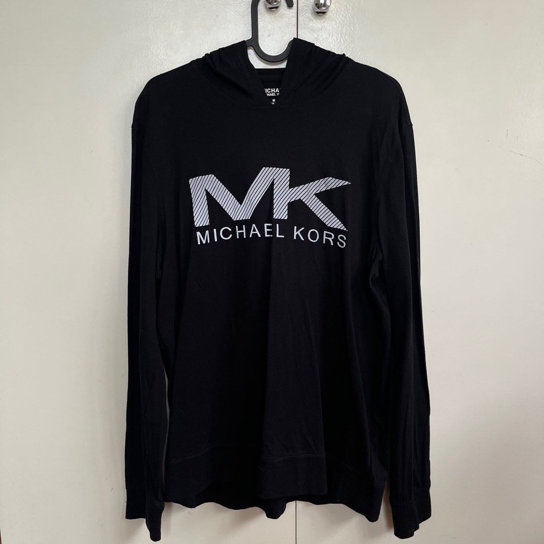 Michael Kors Black Hoodie (Category: Coats, Jackets and Outerwear) located in Rizal. Submitted by camiela (Listing ID 1310882574, Image 1). Description: Authentic Michael Kors Black Hoodie / Sweater In very good condition, no flaws! worn only a few times fabric isn’t thick, perf for PH weather! haha size M .