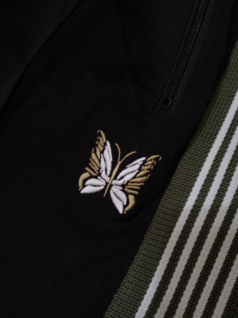 Needles narrow track pants (Category: Joggers) located in Apalit. Submitted by _doer (Listing ID 1310884751, Image 2). Description: Size small Size 30 to 32 37.5 inches length Flaws on bottons only 3500 or OFFER.