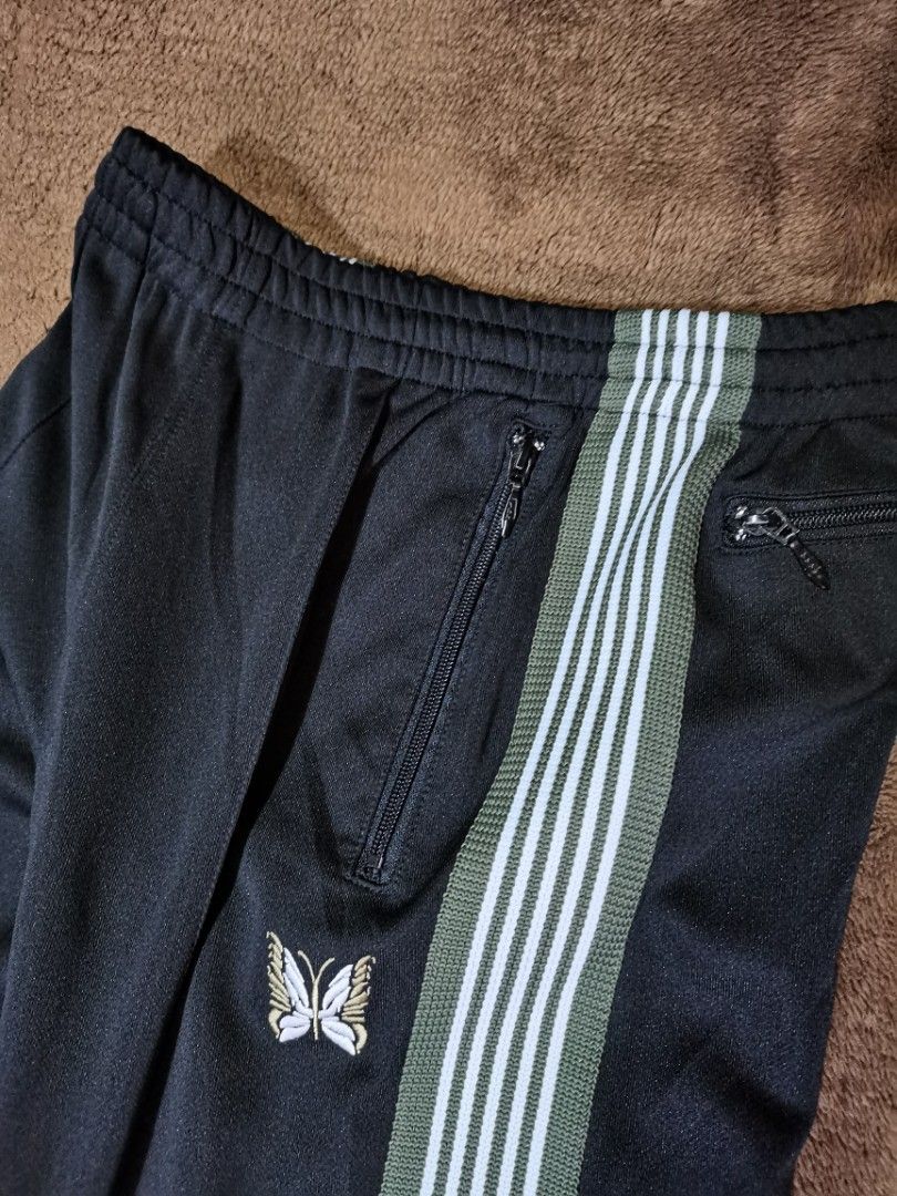 Needles narrow track pants (Category: Joggers) located in Apalit. Submitted by _doer (Listing ID 1310884751, Image 3). Description: Size small Size 30 to 32 37.5 inches length Flaws on bottons only 3500 or OFFER.