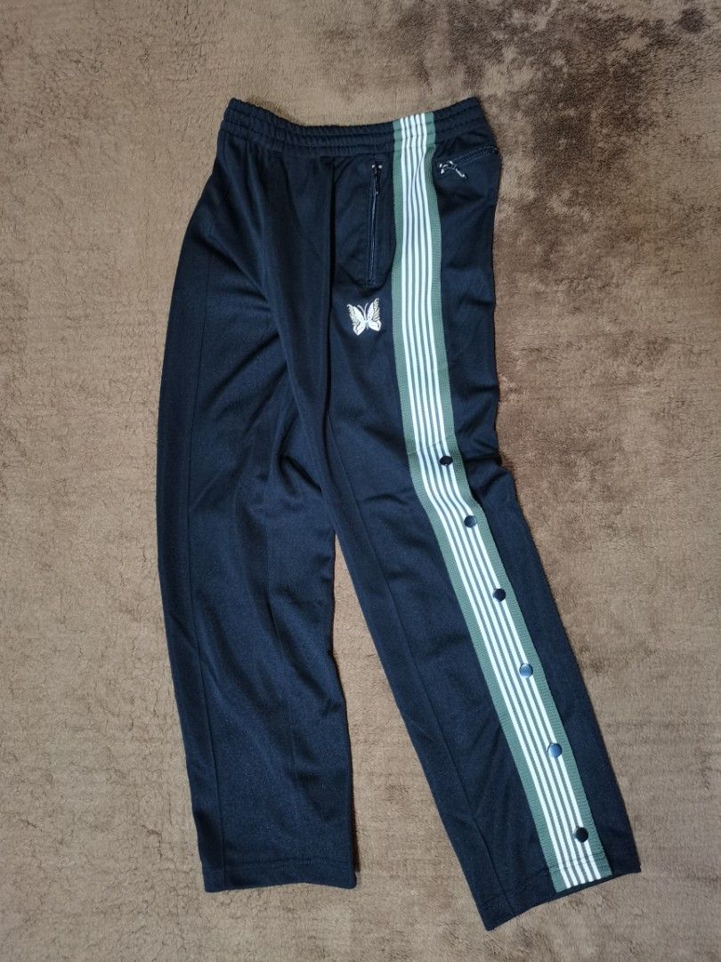 Needles narrow track pants (Category: Joggers) located in Apalit. Submitted by _doer (Listing ID 1310884751, Image 1). Description: Size small Size 30 to 32 37.5 inches length Flaws on bottons only 3500 or OFFER.