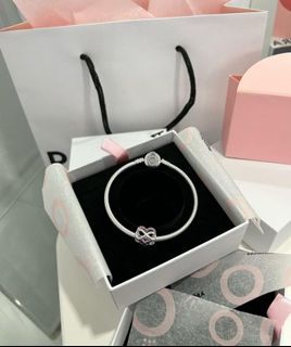 Pandora sparkling crown bracelet and infinity heart charm