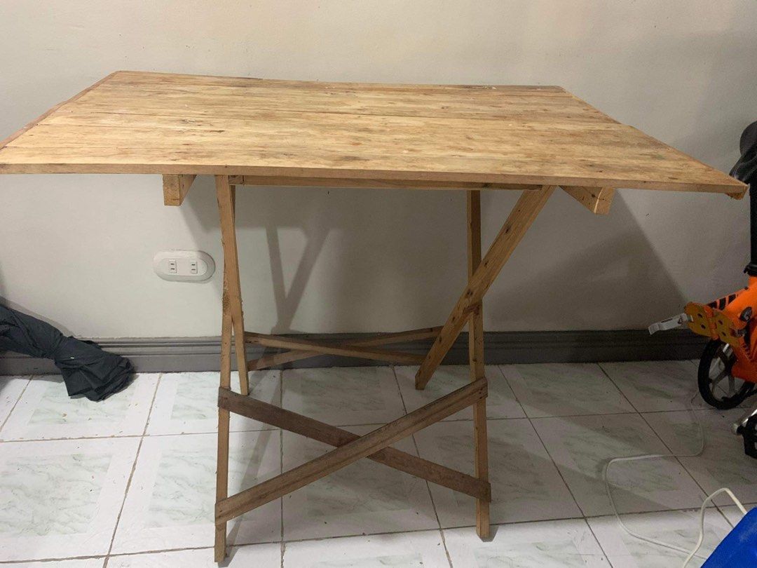 Wooden Foldable Table (Category: Tables & Sets) located in Quezon City. Submitted by cleverwind_103 (Listing ID 1310922829, Image 2). Description: Measurement: 36" by 24" inches and ung height po is 29”.