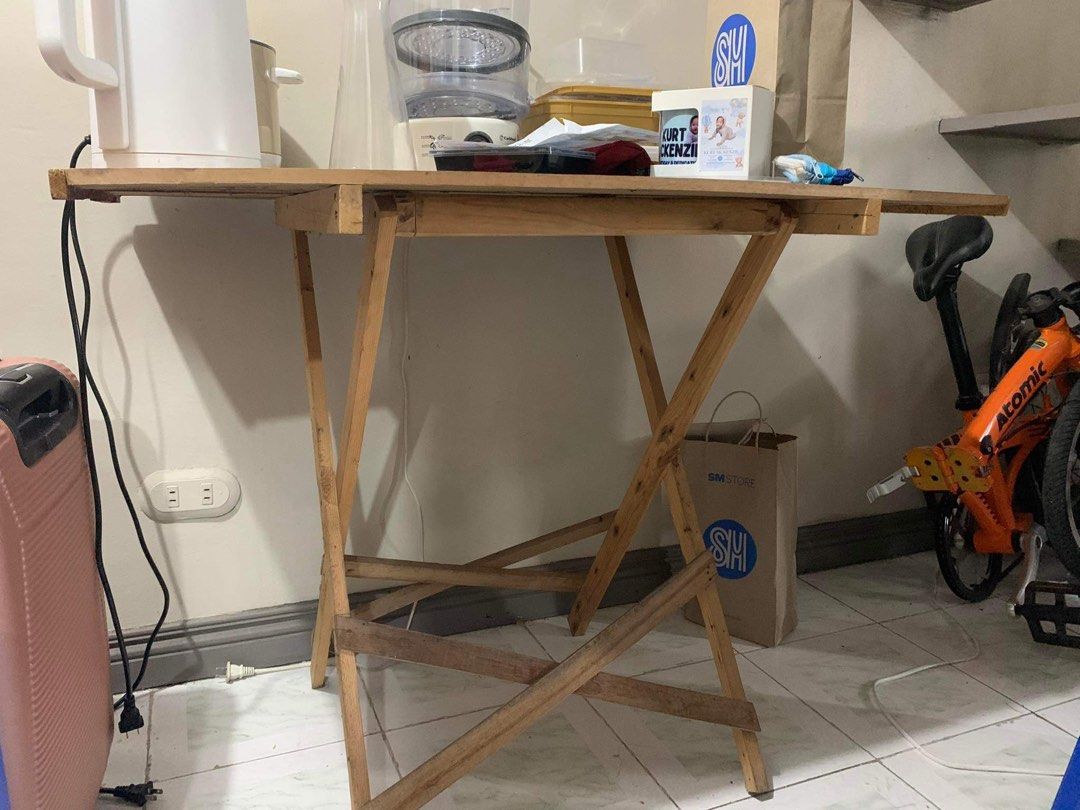 Wooden Foldable Table (Category: Tables & Sets) located in Quezon City. Submitted by cleverwind_103 (Listing ID 1310922829, Image 3). Description: Measurement: 36" by 24" inches and ung height po is 29”.