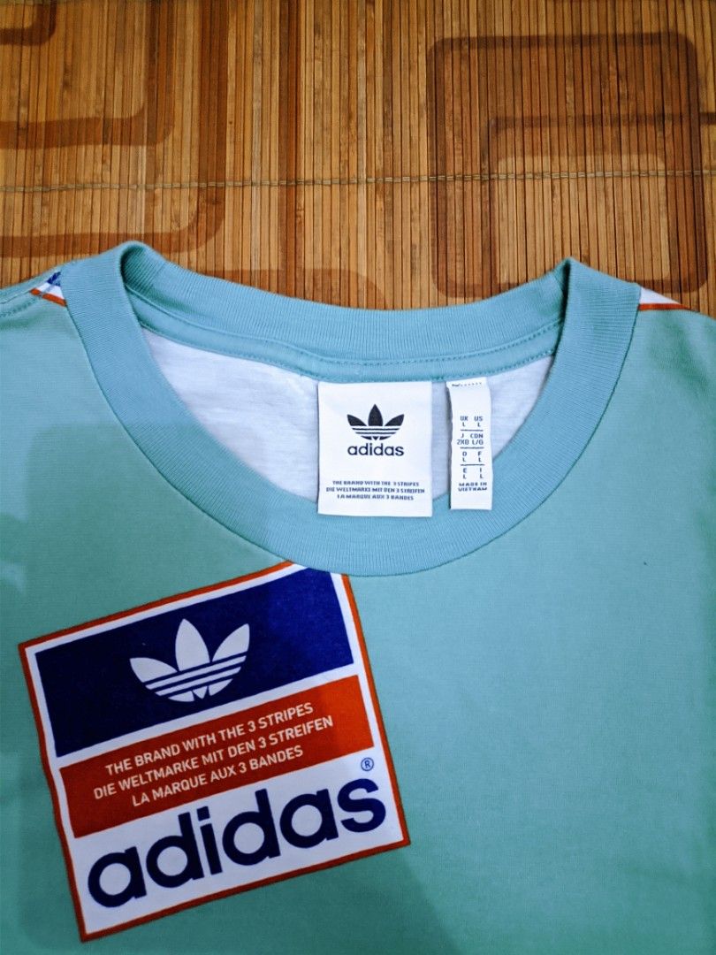 Adidas Originals ARCHIVE STICKER BOMB Graphic TEE Shirt superstar Fesyen Pria Pakaian Atasan di Carousell