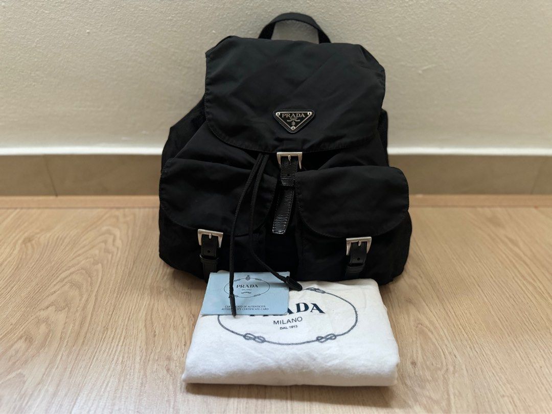 Authentic Prada Black Tessuto Medium Backpack (Category: Bags & Wallets) located in Subang Jaya. Submitted by cc_luxury (Listing ID 1311080708, Image 1). Description: Authentic Prada Black Tessuto Medium Backpack Made in Italy Comes with authentic card and dust cover Condition : 8/10, Good and clean condition Meet up at Subang area .