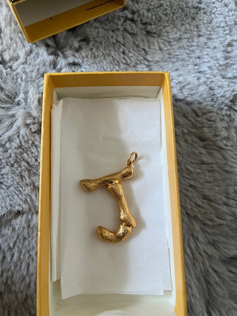 Celine pendant letter J the box fendi box.no receipt. Carousell