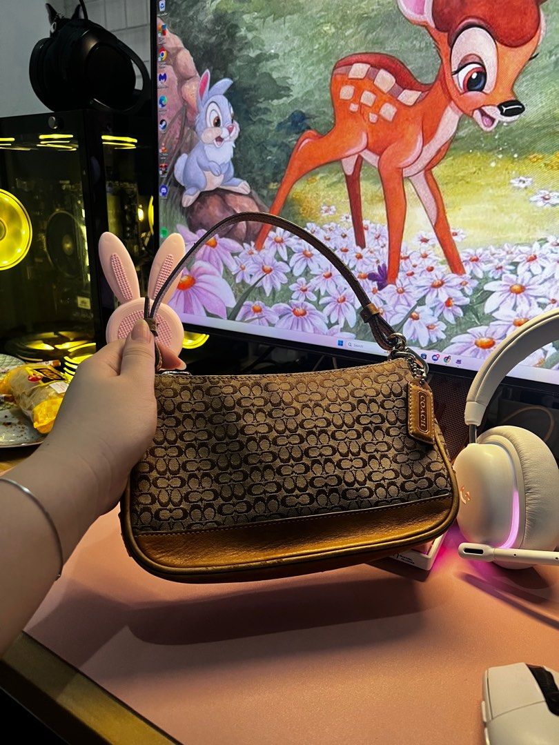 Coach Demi Pochette Bag (Category: Luxury Bags & Wallets) located in Quezon City. Submitted by trisb. (Listing ID 1311137188, Image 1). Description: Bought from Japan 🇯🇵 Hardware: Silver Tone Issue: only sign of usage but hardly noticeable in actual Approximate Dimension in inches: LxWxH 5x8.2×2.3 #kilikilibag #y2k #sidebag .