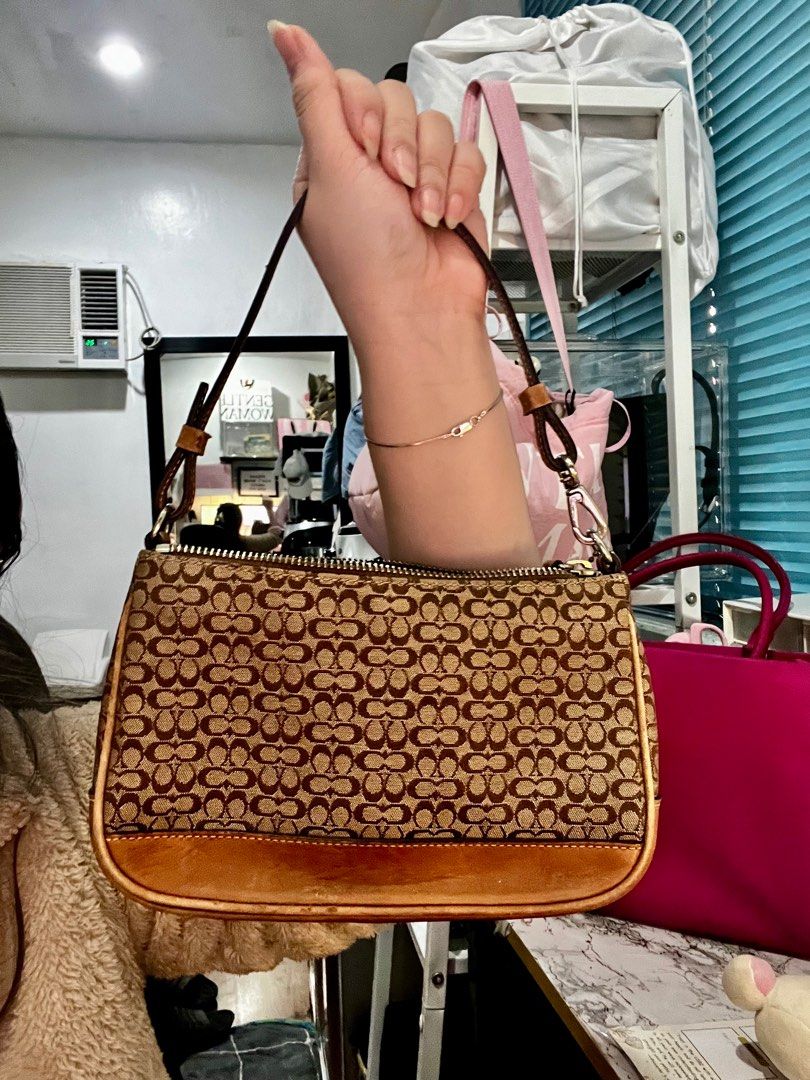 Coach Demi Pochette Bag (Category: Luxury Bags & Wallets) located in Quezon City. Submitted by trisb. (Listing ID 1311137188, Image 3). Description: Bought from Japan 🇯🇵 Hardware: Silver Tone Issue: only sign of usage but hardly noticeable in actual Approximate Dimension in inches: LxWxH 5x8.2×2.3 #kilikilibag #y2k #sidebag .