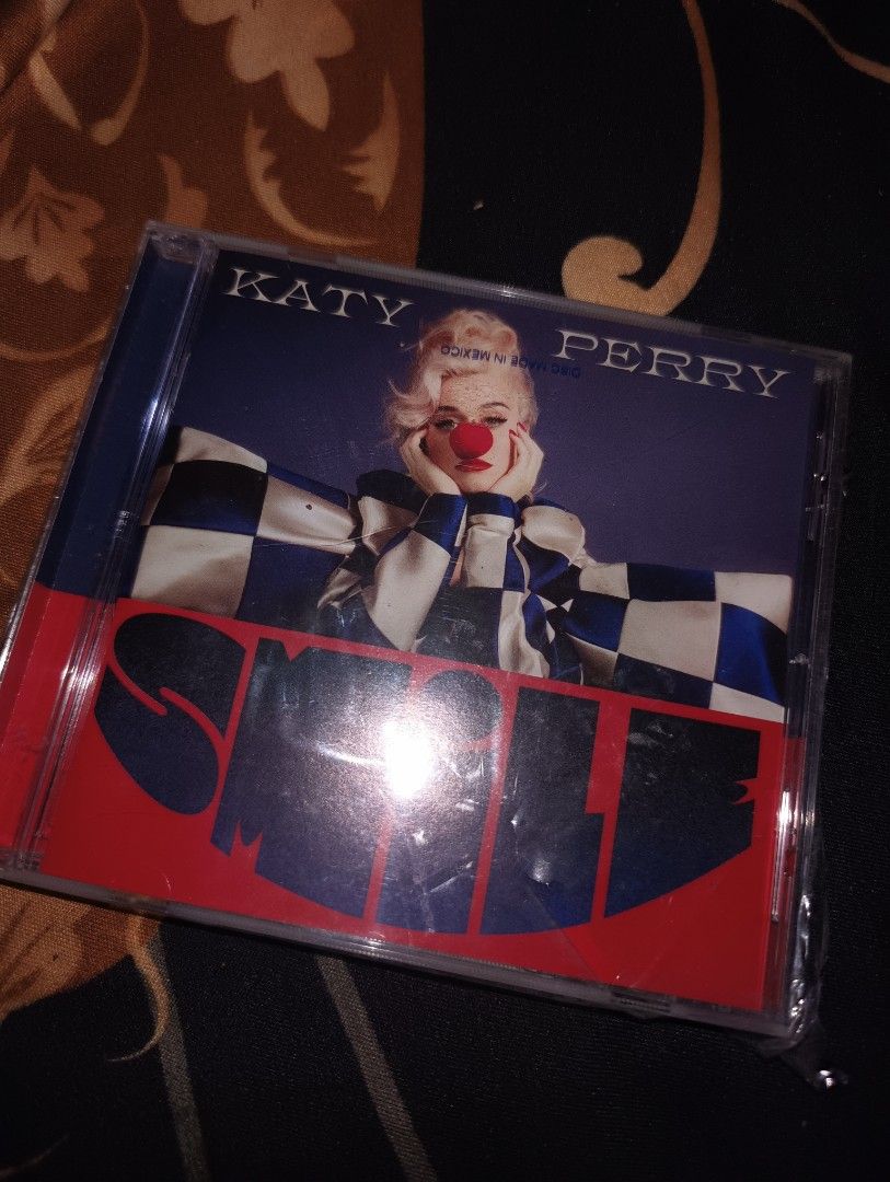 Katy Perry SMILE album (Category: CDs & DVDs) located in Navotas City. Submitted by lockerofmissm (Listing ID 1311127592, Image 1). Description: 1,600 ko binili bought straight from US once opened and played to check kung may talon with bonus track song High on your supply.