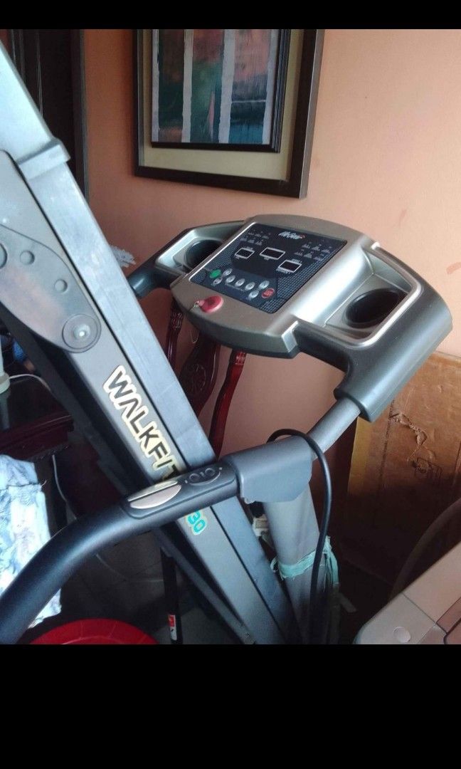 LifeGear WALKFIT 97530 Treadmill (Category: Cardio & Fitness Machines) located in Taguig. Submitted by lourbellea06701 (Listing ID 1311094470, Image 3). Description: PRICE: 10,000 (Still Negotiable) 100% in working condition Bought this around 20k-25k last 2017 Specification: - Manual Fold Up with Gas Assist - Motor Duty: 1.25 HP (Continue); 2.0 HP (Peak) - 1.0~13 Km/Hr Speed Range - 3-level Manual Incline - 3 Instant Speed Buttons - Built-in Cup