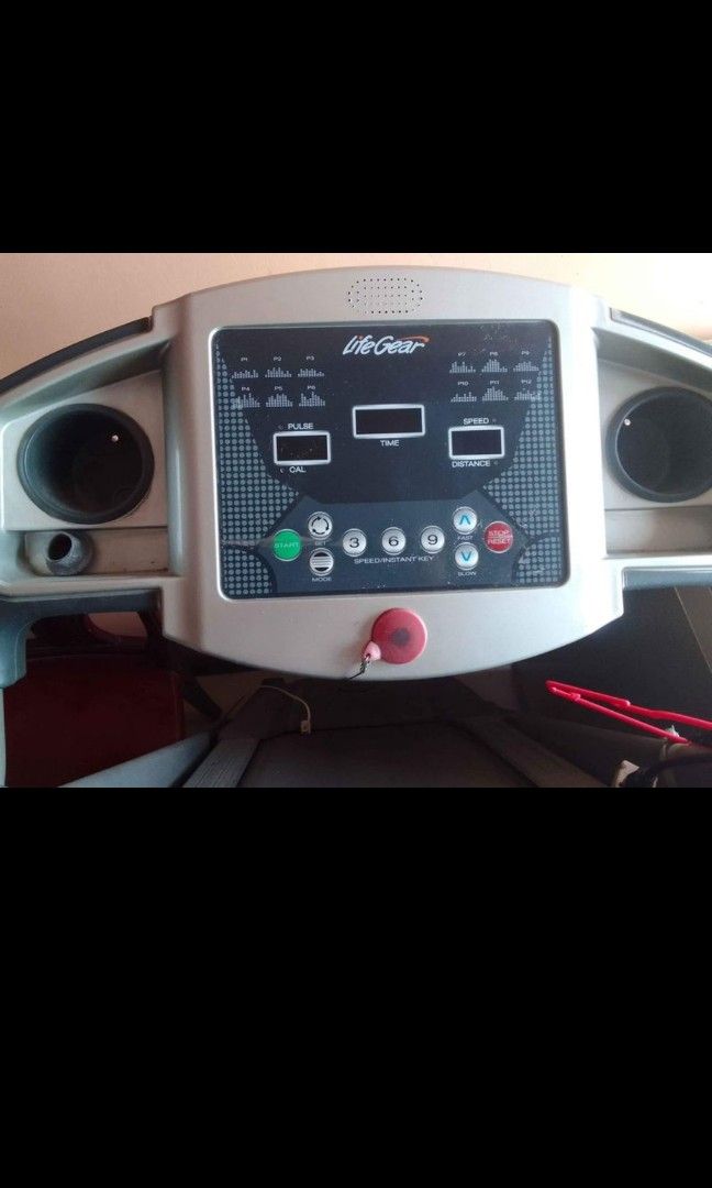 LifeGear WALKFIT 97530 Treadmill (Category: Cardio & Fitness Machines) located in Taguig. Submitted by lourbellea06701 (Listing ID 1311094470, Image 1). Description: PRICE: 10,000 (Still Negotiable) 100% in working condition Bought this around 20k-25k last 2017 Specification: - Manual Fold Up with Gas Assist - Motor Duty: 1.25 HP (Continue); 2.0 HP (Peak) - 1.0~13 Km/Hr Speed Range - 3-level Manual Incline - 3 Instant Speed Buttons - Built-in Cup