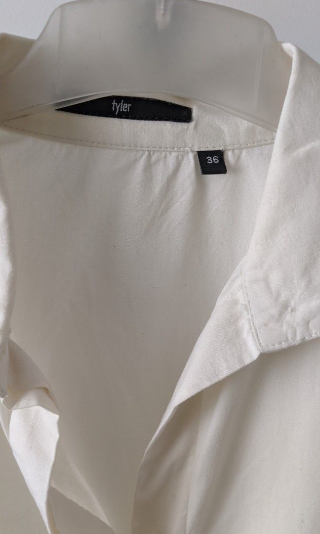 Off-white shirt dress (Category: Dresses) located in Mandaluyong City. Submitted by clf97 (Listing ID 1311043193, Image 2). Description: Light coloured long-sleeved shirt dress with structure cuffs. Fabric is on the thin side, best paired with leggings or skinny jeans..