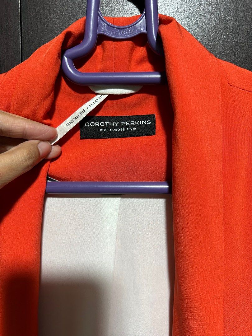 Orange blazer (Category: Coats, Jackets and Outerwear) located in Quezon City. Submitted by ankeyt (Listing ID 1311120089, Image 2). Description: Soft blazer Photo is brighter than actual Fits small to medium For Metro Manila buyers only - shipping through grab/lala.