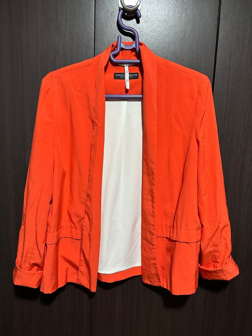 Orange blazer (Category: Coats, Jackets and Outerwear) located in Quezon City. Submitted by ankeyt (Listing ID 1311120089, Image 1). Description: Soft blazer Photo is brighter than actual Fits small to medium For Metro Manila buyers only - shipping through grab/lala.