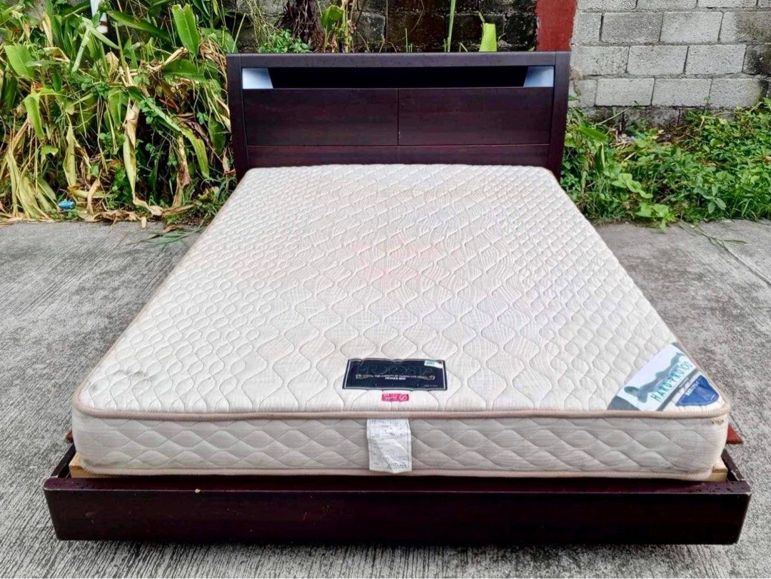 Queen size bed set (Category: Bed Frames & Mattresses) located in Quezon City. Submitted by matetdevis13 (Listing ID 1311112929, Image 2). Description: Queen Size Bed Set Floating Style 60”L x 85”W Php 14,000 Solid wood bedframe FranceBed Hard Pro mattress In good condition.