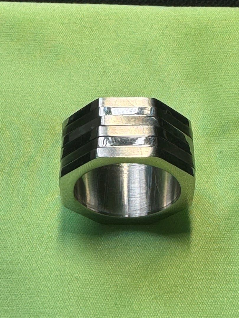 Ring (Category: Jewelry) located in Singapore. Submitted by draculla (Listing ID 1311090688, Image 3). Description: Bought from Arthesdam Jewellers Stainless Steel Broad ring 8 mm Every ring moving despite all connected Good for collection and for occasional wearing.