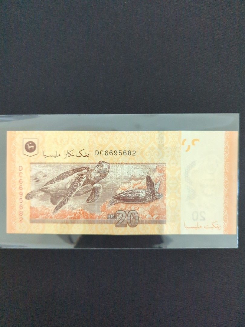 RM20 error note (Category: Currency) located in Port Dickson. Submitted by RarePiece99 (Listing ID 1311036930, Image 3). Description: cutting error condition EF-GEF Prefix DC.