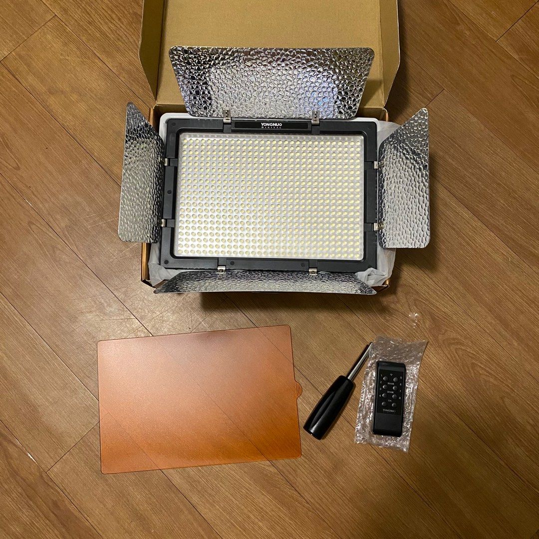 Yongnuo YN600II-L Led Video Light (Category: Lighting & Studio Equipment) located in Makati City. Submitted by jajaluc8 (Listing ID 1311098076, Image 2). Description: Model: YN600II-L Light Source: 600 LED beads Luminance Angle: 55° Color Temperature 5500k Remote Control Distance: more than 15m Power: 36W Weight: 1320g Lumen: 4800LM Size:260*188*40 Package Content: 5500K LED light Panel 2.4G Wireless Remote Hand Grip User Manual CT Filters x 2 Ad