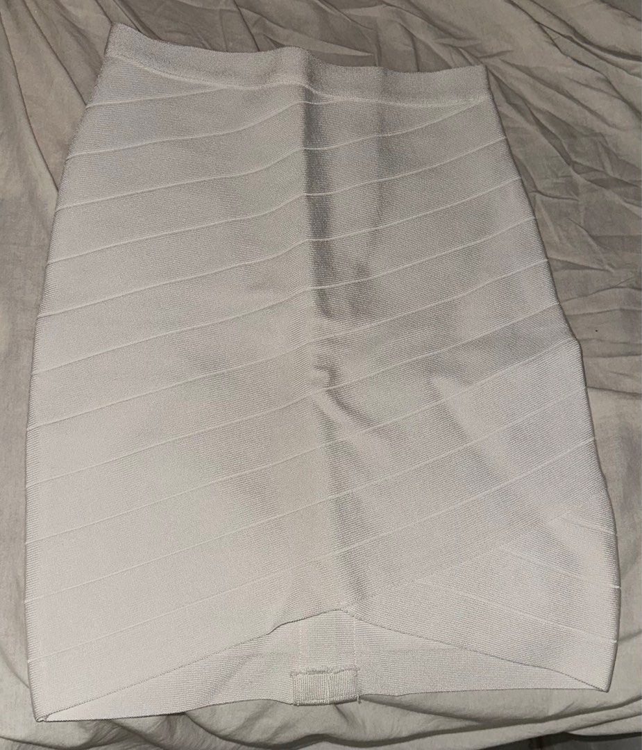 Bebe White Bandage Skirt (Category: Skirts) located in Quezon City. Submitted by anjellyqa (Listing ID 1311269243, Image 1). Description: -original -good condition -worn once (sukat lang) -size XS but can fit up to small rfs: does not fit me pm for more pics 🏷️mop: gcash, bdo.