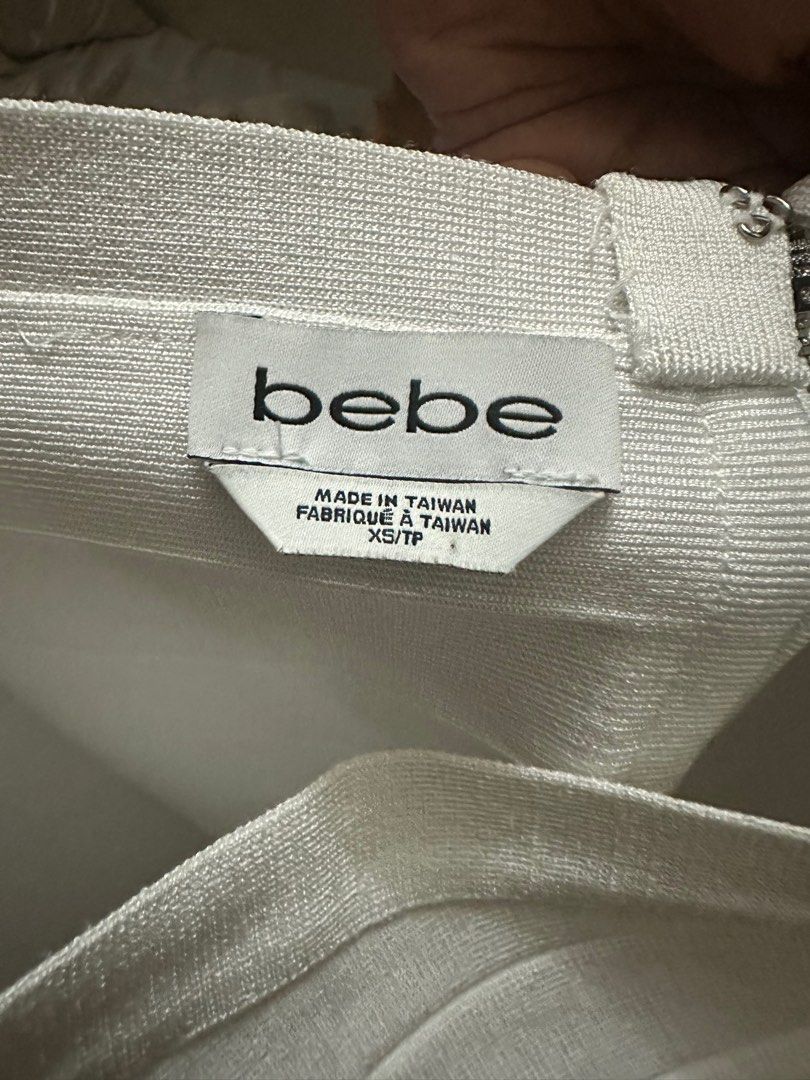 Bebe White Bandage Skirt (Category: Skirts) located in Quezon City. Submitted by anjellyqa (Listing ID 1311269243, Image 2). Description: -original -good condition -worn once (sukat lang) -size XS but can fit up to small rfs: does not fit me pm for more pics 🏷️mop: gcash, bdo.
