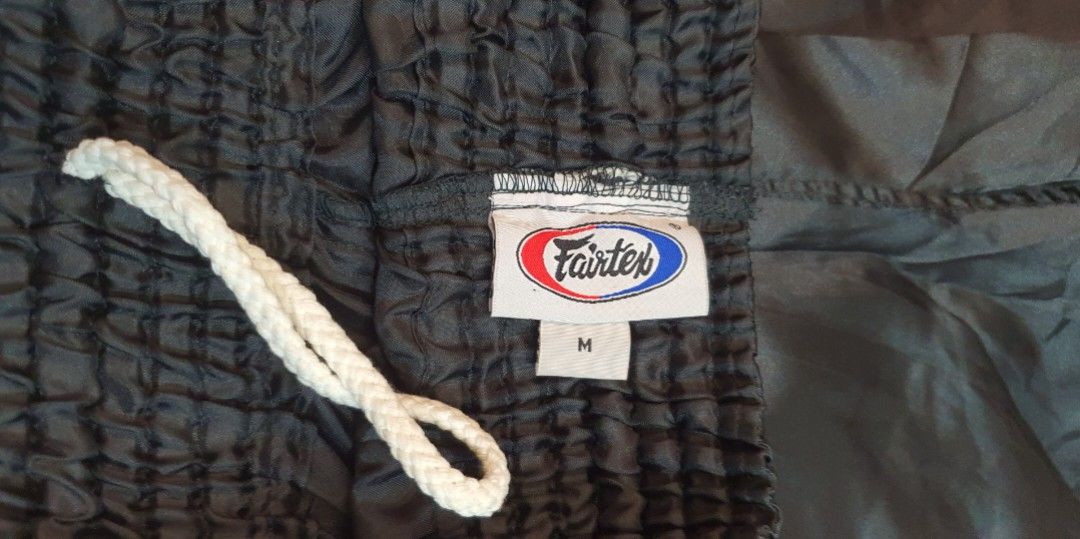 FAIRTEX MMA SHORTS "ETERNAL SILVER" (Category: Activewear) located in Manila. Submitted by happy.we.go (Listing ID 1311287547, Image 3). Description: medium on tag.