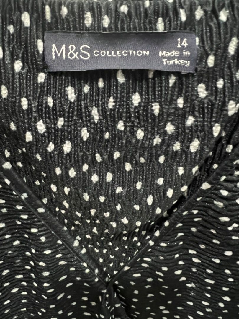 Marks & Spencer Polka Dot Twist Front Short Sleeves Blouse (Category: Blouses) located in Carmona. Submitted by raest16 (Listing ID 1311263807, Image 2). Description: Unused Blouse. Washed and was stored. Black Polka Dots, V-neck and has twist in the tummy area Size: UK 14 MOP: Cgash, BDO Shipping: LBC, Lalamove c/o Buyer Location: Carmona Cavite.