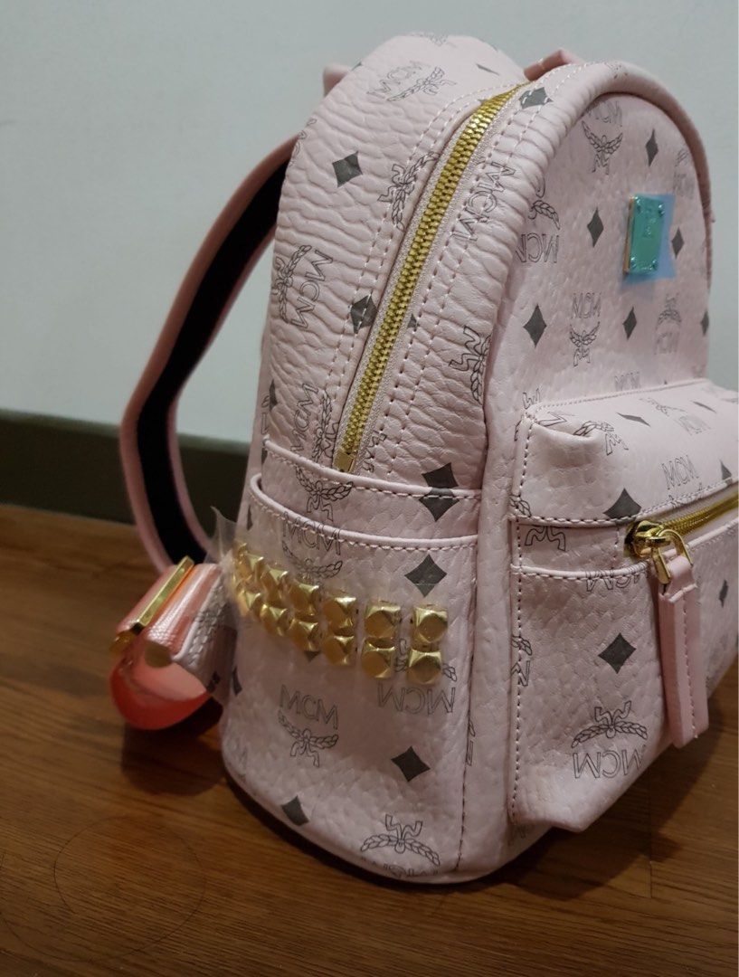 MCM Backpack (Category: Bags & Wallets) located in Kuala Lumpur. Submitted by Bestinclass88 (Listing ID 1311287336, Image 3). Description: MCM backpack. Pink color. 21cm X 27cm height. RM150 only..