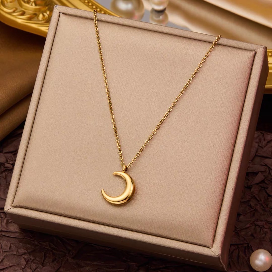 Moon crest necklace
