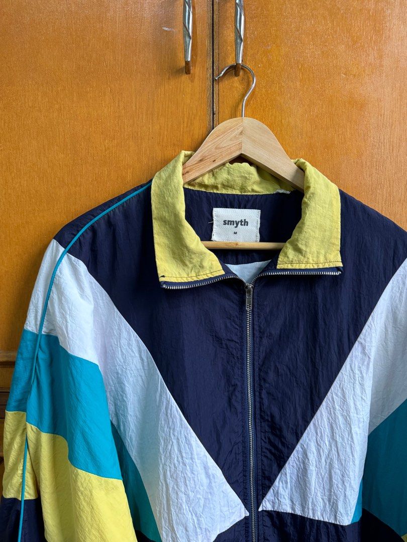 SMYTH Blue/Yellow Windbreaker (Category: Coats, Jackets and Outerwear) located in San Mateo. Submitted by da3dalus (Listing ID 1311240047, Image 2). Description: Condition: 9/10 - no noticeable flaws RFS: decluttering — fits S-M body frames — photo may not reflect actual color due to lighting — photo when worn may/may not be available upon request • Mode of Payment: GCash only • Shipping* via LBC**, Lalamove, GrabExpress, Angkas Padala, GoGoExpre