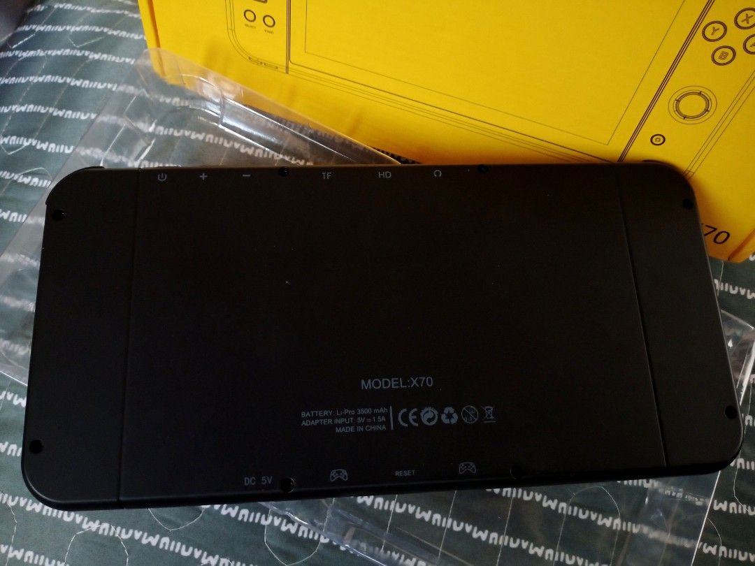 X70 Powkiddy Retro Video Game Console (Category: In-Game Products) located in Abucay. Submitted by abpshop (Listing ID 1311179257, Image 3). Description: Brandnew x70 powkiddy video gaming console, complete w/box, charging cable, user manual Payment Method: via Gcash + SF shoulder by buyer Courier: J&T Express.