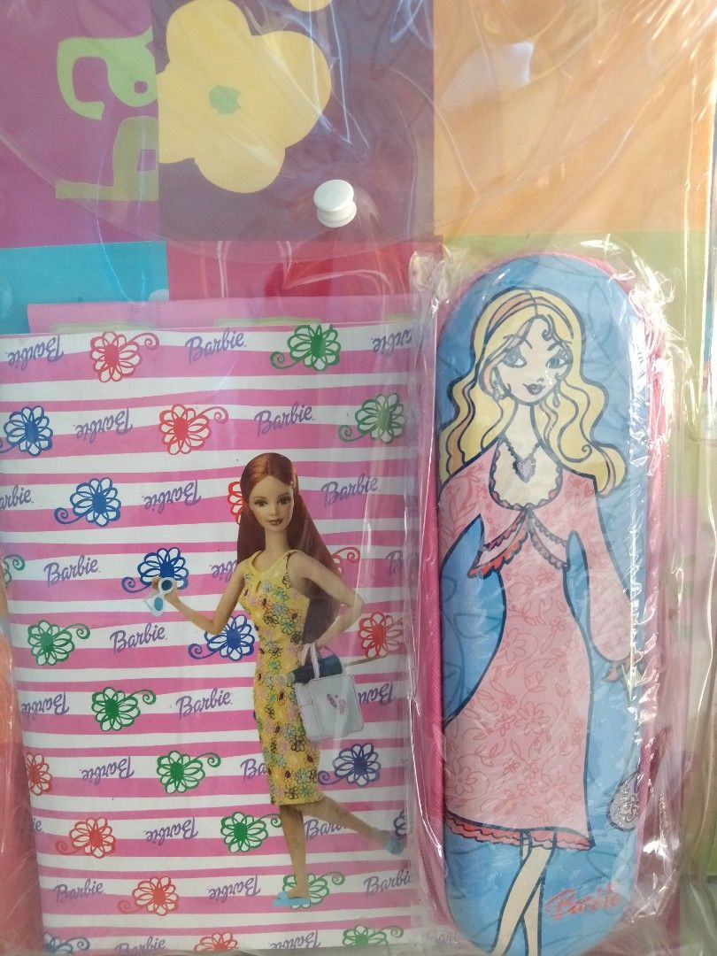 Barbie Stationary set by MERIT (Category: Stationery & School Supplies) located in Davao. Submitted by jeffsantos (Listing ID 1311347406, Image 1). Description: AUTHENTIC BARBIE STATIONARY SET BY MERIT Includes: Notebook, drawing book, pencil case, pencils, folder and other..