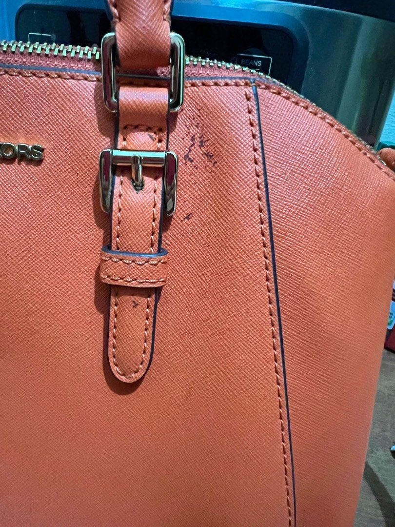 MK carry all (Category: Luxury Bags & Wallets) located in Taguig. Submitted by marshmy (Listing ID 1311483620, Image 2). Description: Pre-loved bag with flaw.