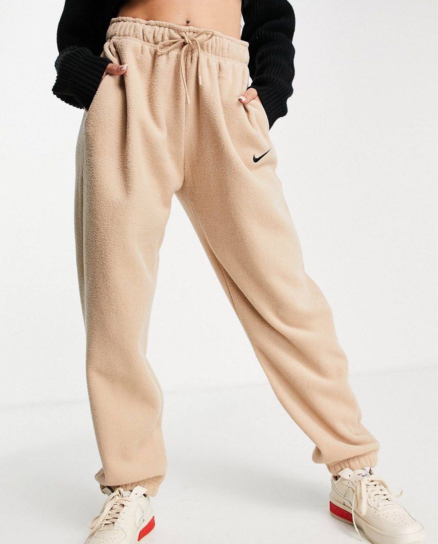 Nike mini swoosh joggers 2025