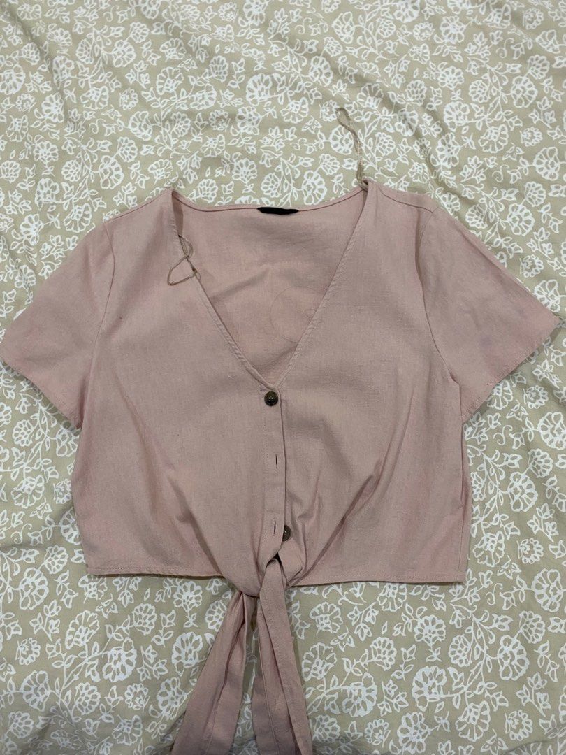 Pink tie top (Category: Blouses) located in Pasig City. Submitted by declutter890 (Listing ID 1311368244, Image 1). Description: Bought in Australia.